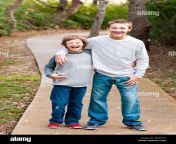 cute happy teen brothers laughing outdoors dkkh73.jpg from xxxxx videos young brother and elder sister