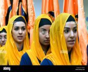 young sikh women in temple or gurdwara during festival of vaisakhi ayayex.jpg from sikh college gal