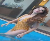 rubina dilaik sets the temperature high in a yellow sexy swimsuit during a pool photoshoot 2.jpg from rudina dilaik sexy