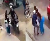 indian woman stops thief on motorbike stealing her chain f.jpg from desi thief