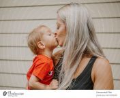 4583288 little golden blonde boy kissing his mom on the lips photocase stock photo large jpeg from mom kis