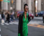 fashion week guest wearing a black leather coat and a green news photo 1672741522 jpgresize980 from fashion t