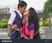 stock photo younger brother kissing sister and holding her in hands 1480777871.jpg from indian sister brother kiss