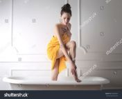 stock photo girl shaving her leg in the bathtub 524565697.jpg from 14 sex bathroom sheving