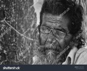 stock photo tindivanam tamil nadu india a typical indian village grandpa relaxing under a 1358319431.jpg from indian village grandpa