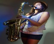 female artist in hat playing on sax 1301 2263.jpg from gals woman sax f