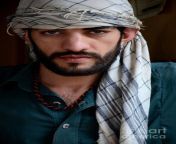 pakistani pashtun man models with headscarf and necklace peshawar pakistan imran ahmed.jpg from cute real pakistan pathan phd ex