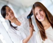woman at salon flat iron.jpg from hair job