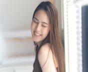 portrait young cute asian girl closing her eyes with smile standing window 78212 285.jpg from asian cut gril