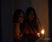 two young and beautiful indian bengali women in indian traditional dress are celebrating diwali with diyalamp and fire crackers on a balcony in darkness indian lifestyle and diwali celebration 700 195793356.jpg from indian bengali women sex videosসরাসরি বাসর