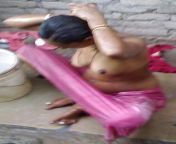 village woman bathing in pink petticoat.jpg from nude village aunty bath petticoat