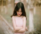 shallow focus photography of woman in pink dress.jpg from ongirl