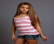 a beautiful young girl posing on gray.jpg from young pics