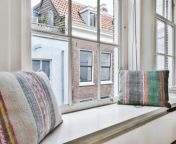 cushions on windowsill near window 1024x683.jpg from window kama