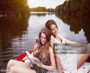 portrait of a mother and her teenage daughter relaxing in a red boat jpgs612x612wgik20c xxslrheiidjli5rywfpkksrzvxxfpgvmwxlomy4mxe from mom and 12 so