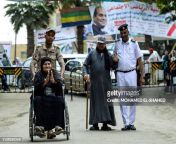 an egyptian soldier pushes an elderly woman on a wheelchair clapping her hands while a jpgs612x612wgik20cqmlcfvcuxvn5f1xguruxryknfb26ndgxwkoiibv rjw from egyptian mature man old woman fuck chilly