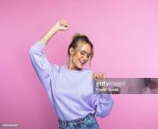 happy woman dancing against pink background jpgs612x612wgik20chhd95zpoah03gqjkn6fm0bjotvesinom en2odgday8 from 4076904 jpg