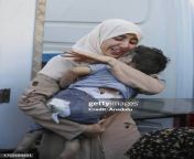 gaza a woman mourns as she carries body of her child who lost his life after israeli attacks jpgs612x612wgik20clnbus ouieh5r4lytpem7soiwd rbr8ylzdh989dghk from body of