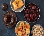 13231136 traditional arab fresh hot tea time with sweets baklava dates and lokum.jpg from fresh arab