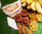 a group of cultural food items on a banana leaf showing the amazing food habits of the sinhalese ethnic group in sri lanka.jpg from sinhala foo