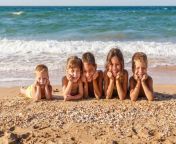 kids at beach.jpg from nudist family at nude beach