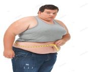 pngtree obese man sucks in gut while measuring waist with tape photo image 49666098.jpg from मोटा आदमी स