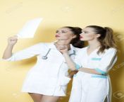 42055381 two young smart serious attractive doctor and nurse in white medical uniform with stethoscope on.jpg from sexy doctors and nurses best action and hospital