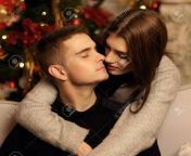 79781331 young romantic cute couple staing at home and enjoying time together lovers hugging in cristmas.jpg from young cute romance enjoy with massage xnxn pk এক্সনক্সন