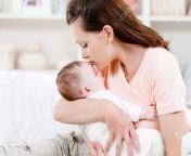 7294720 young mother kissng her small sleeping newborn baby indoors.jpg from small and his mom