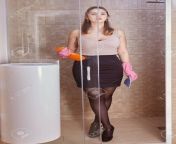 141856495 attractive young caucasian housemaid about 22 years old in elegant miniskirt is cleaning shower.jpg from 22 house maid