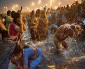 0045 india allahabad maha kumbh mela crowd night worship ganges royal bath 2013.jpg from kumbh snan indian women bath wet nipple