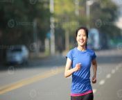 fit sports woman running on asphalt road photo.jpg from 1185495 jpg