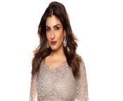 raveena tandon 172512963 16x9 0 jpgversionidpjnouckg9hshbn8vsoerm7w804j3xvys from bollywood actress raveena tandon listens during a news conference to announce the launch of her new television serial sahib biwi gulam or husband wife slave in bombay april 7 2004 the serial which portrays the feudal system of 19th century india is about a woman who turns to alcohol to win back her philandering husband 2d4ah9e jpg