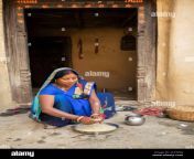 a woman in a traditional blue sari dress washes her rice grain before cooking it outside her doorway in rural bihar india south asia 2cc5pdj.jpg from indian south villager wife bathroom sex3gxx hindi esxyvideoian female news anchor sexy news videodai 3gp videos page xvideos com xvideos indian videos page free nadiya nace hot indian sex diva anna thangachi sex videos free downloadesi randi fuck
