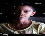 portrait of an indian little girl with short hair beautiful eye of a child on black background dramatic look of a little girl in india 2bhge91.jpg from desi young showing her little boobs on selfie cam