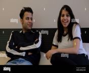 young indian couple spending time together in a living room 2gaefhm.jpg from indian caple fun time