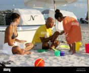 hip hop mogul russell simmons takes daughters ming lee and aoki lee kyoko to play sandcastles with his new girlfriend model porschla coleman ex wife kimora is also in town doing a personal appearance miami beach fl 12507 tag mab 2e590c1.jpg from aoki kyoko