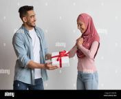 loving arab man giving present to his excited muslim girlfriend in hijab 2e8jypa.jpg from muslim hijab girlfriend gives a perfect blowjob and tease with her tongue 841 indian muslim colorful hijab blowjob desi immfuck 10 months ago