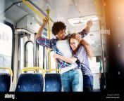 young gorgeous playful girl is hugging her cheerful and surprised boyfriend in a bus 2djay55.jpg from bf bus