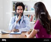 pakistani male doctor listening to female patient at hospital 2g3613n.jpg from pakistani pathan doctor and patient xxx