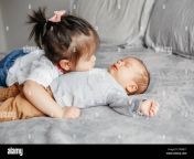 cute toddler older sister hugging newborn younger baby brother boy 2f9mj17.jpg from young sister and little brother sex desi bengali beautif