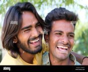 portrait of a young cheerful indian gay couple embracing and smiling in a park 2fa4y3t.jpg from desi land selfii gay