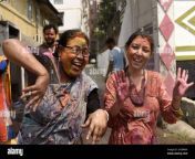 women playing holi in front of their residence in guwahati assam india on sunday 28 march 2021 photo by david talukdarnurphoto 2kcbm0x.jpg from holi assam women