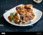 crispy deep fried pork hind on a white plate 2h5ddm8.jpg from hind fried