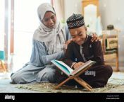 love is the supreme form of communication shot of a young muslim mother and her son reading in the lounge at home 2k2d5p1.jpg from muslim mom vs son real sex tamili village school sex mom son xvideos