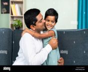 little toddler daughter hugging father by kissing at home concept of love parenthood and harmony 2jb53t7.jpg from desi daughtr dad sexxx