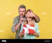 mature man got surprise for his loving wife woman holding gift box man covering her eyes and showing silence gesture 2jk7ejx.jpg from dude covers his girlfriend39s face in cum