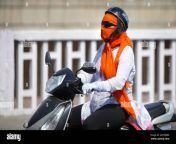 an indian woman rides a scooter with her face covered with a cloth to protect her from a heat wave in jammu india thursday may 19 2016 scorching summer temperatures hovering well over 40 degrees celsius 104 fahrenheit are making life extremely tough for millions of people across north india ap photochanni anand 2mymbb0.jpg from north indian aunty riding hot
