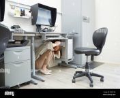 woman hiding under a desk in an office 2pkcck2.jpg from indian aunty under desk hidden cam