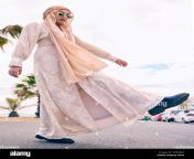 beautiful young arab woman posing outdoors in a headscarf attractive female muslim wearing a hijab posing outside shes all about style and fashion mixed race woman looking confident and trendy 2pr7jkg.jpg from arab hijab outdoor